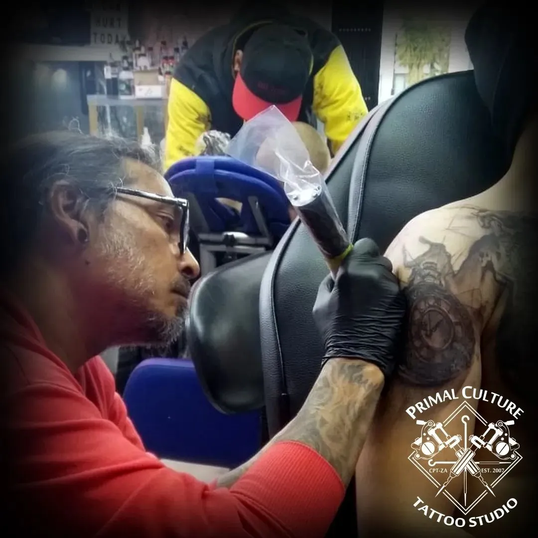 Primal Culture - Clinton Naidoo doing a shoulder tattoo